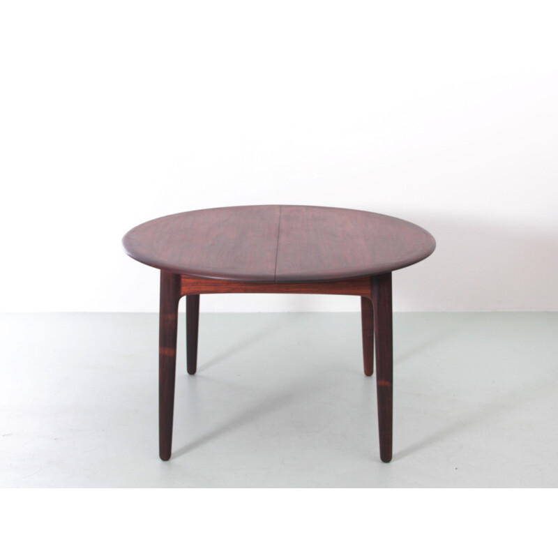 Scandinavian vintage round table with 2 extensions in Rio rosewood 