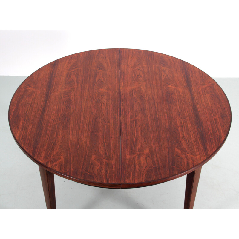 Scandinavian vintage round table with 3 extensions in Rio rosewood