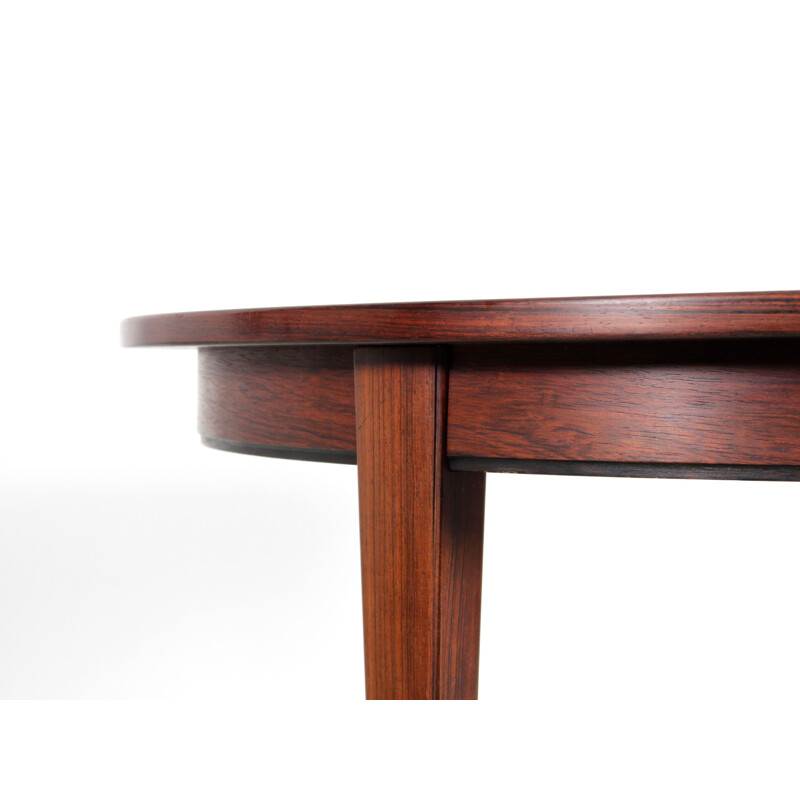 Scandinavian vintage round table with 3 extensions in Rio rosewood