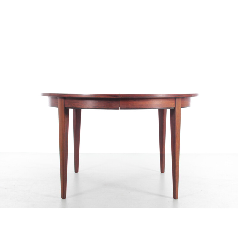 Scandinavian vintage round table with 3 extensions in Rio rosewood