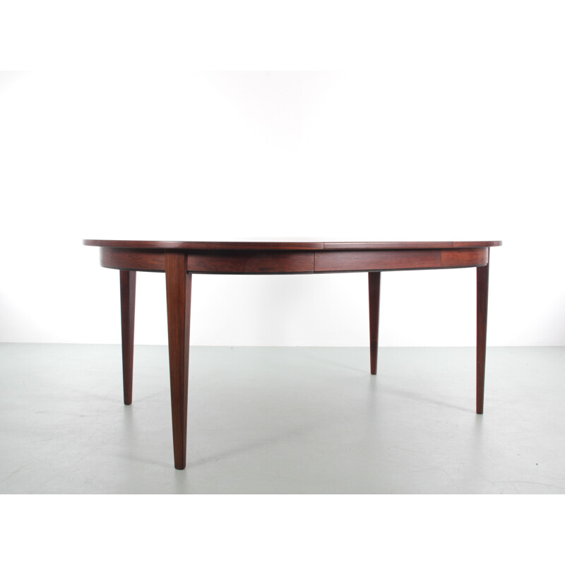 Scandinavian vintage round table with 3 extensions in Rio rosewood