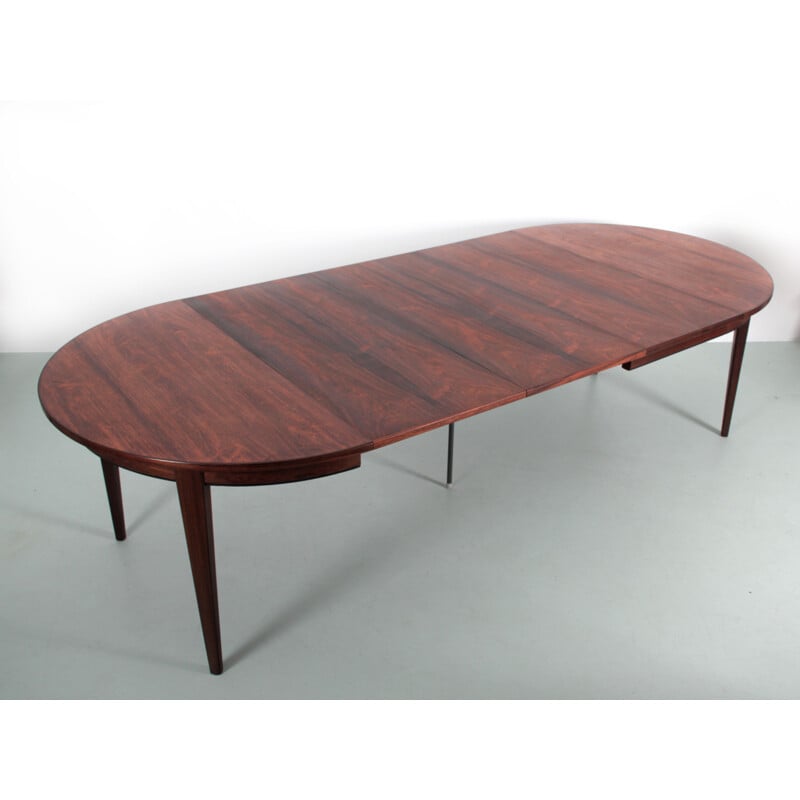 Scandinavian vintage round table with 3 extensions in Rio rosewood