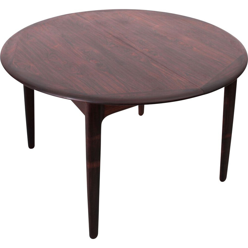 Scandinavian vintage round table with 2 extensions in Rio rosewood 