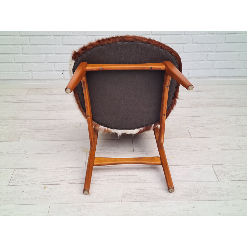 Danish vintage cowhide chair by Ib Kofod Larsen for Christensen & Larsen, 1970s