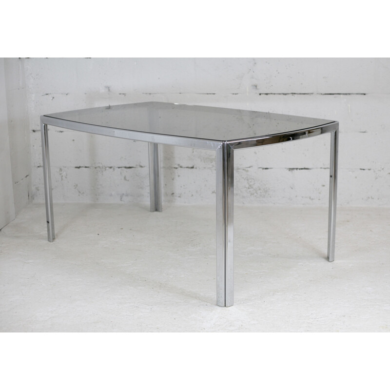 Vintage living room table in chrome-plated metal and curved smoked glass slab, France 1970s