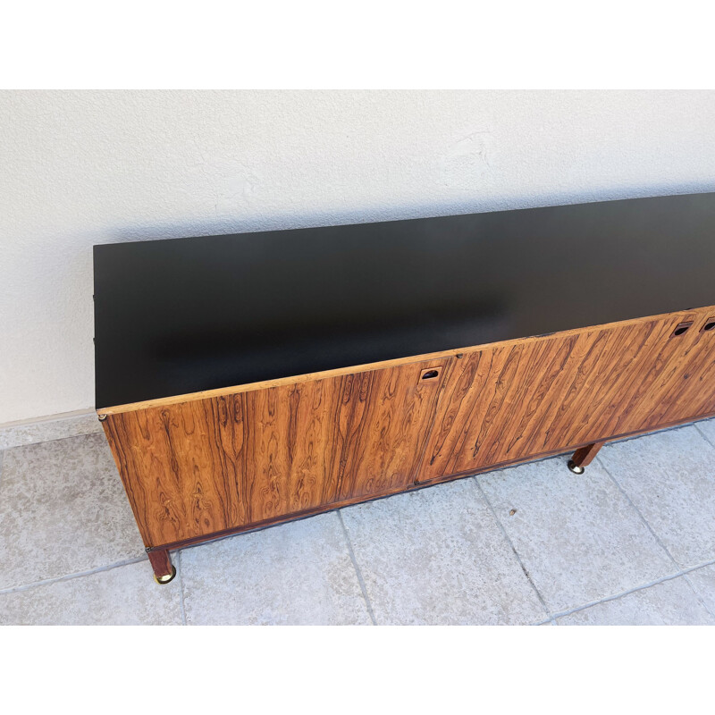 Vintage rosewood sideboard by André Monpoix 