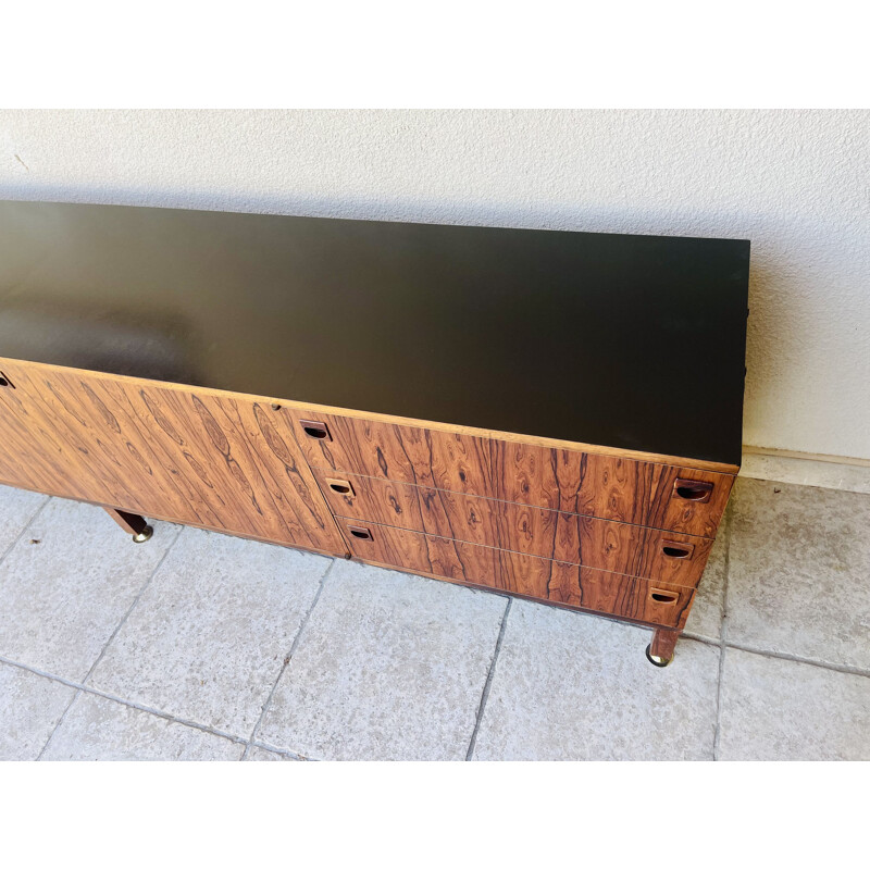 Vintage rosewood sideboard by André Monpoix 