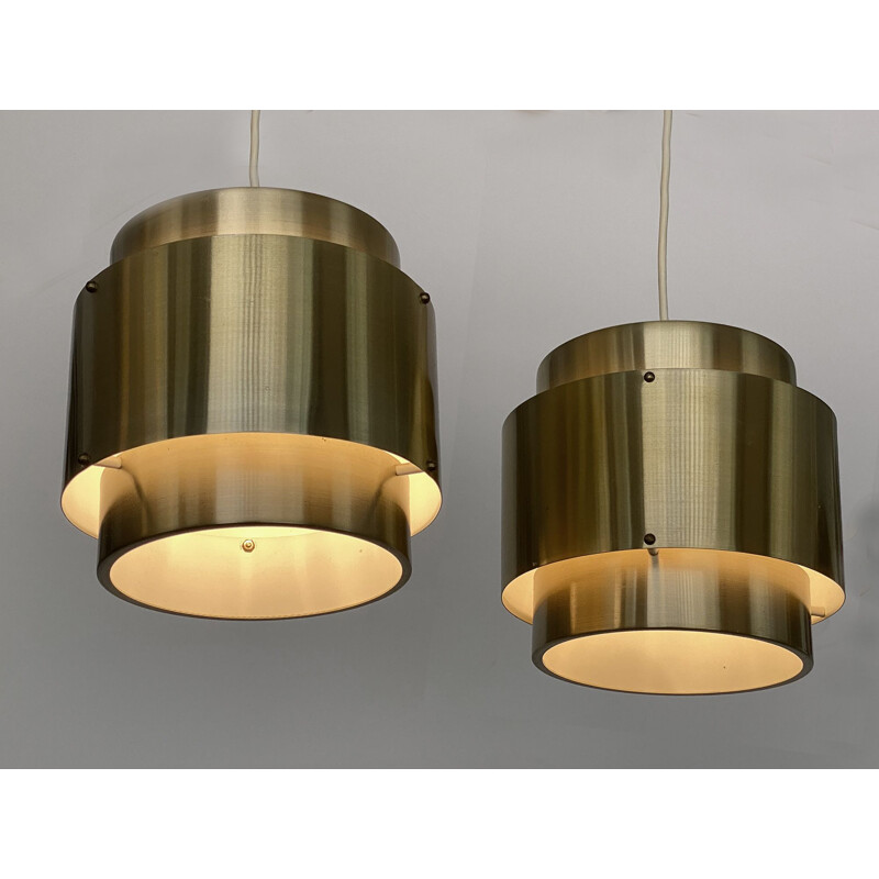 Pair of vintage pendant lamps in brushed golden aluminum, Sweden 1960s