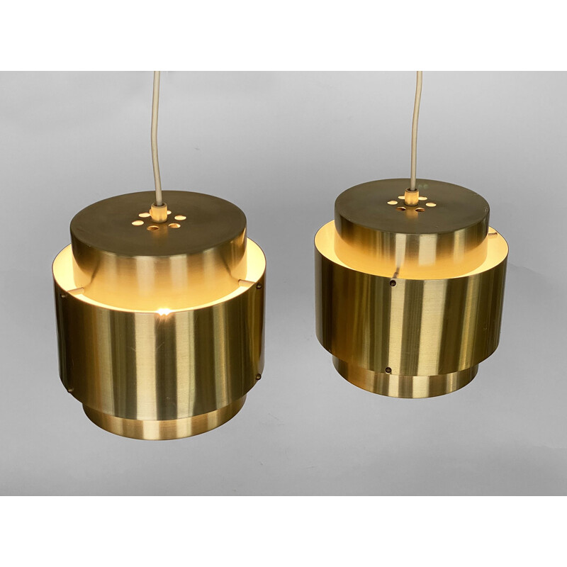 Pair of vintage pendant lamps in brushed golden aluminum, Sweden 1960s