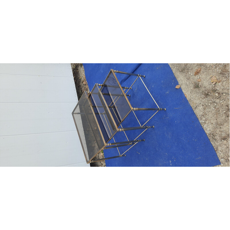 Vintage nesting tables in brass and smoked glass