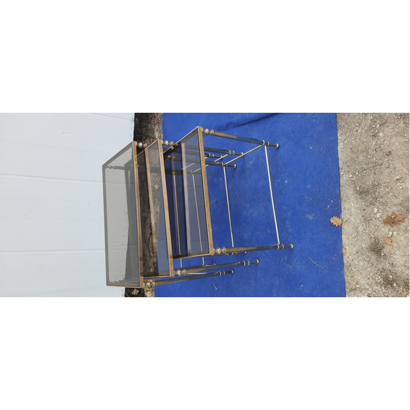 Vintage nesting tables in brass and smoked glass