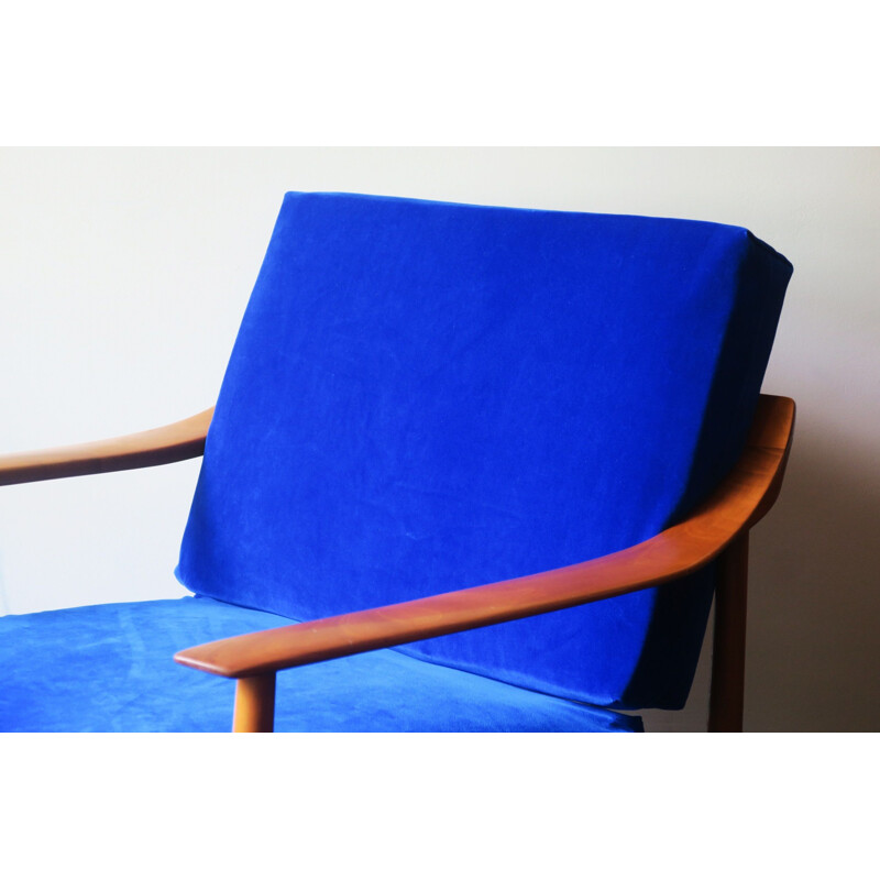 Mid century blue velvet armchair with curved back & sprung cushions, 1960s