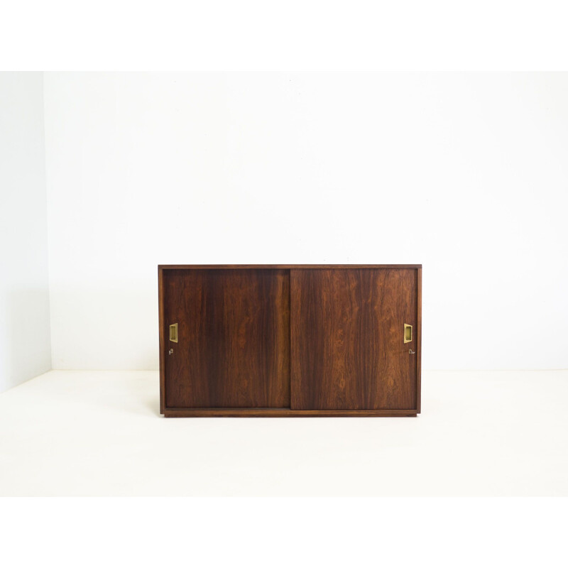 Vintage double sided rosewood lowboard with sliding doors