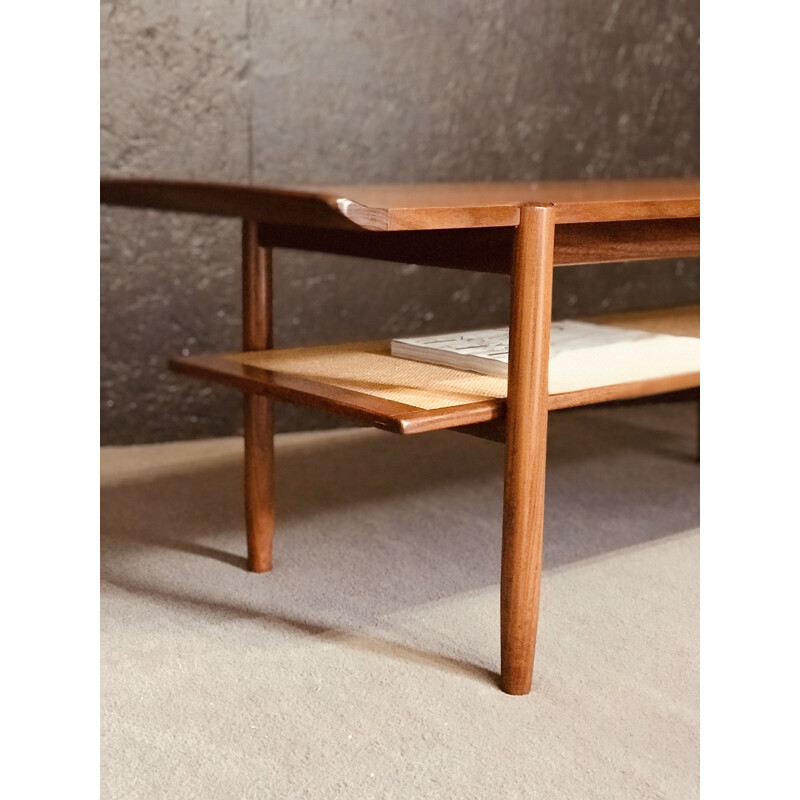 Mid century Danish teak coffee table with a rattan rack, 1960s