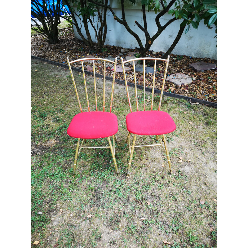 Coppia di sedie vintage in metallo dorato e seduta in tessuto rosso