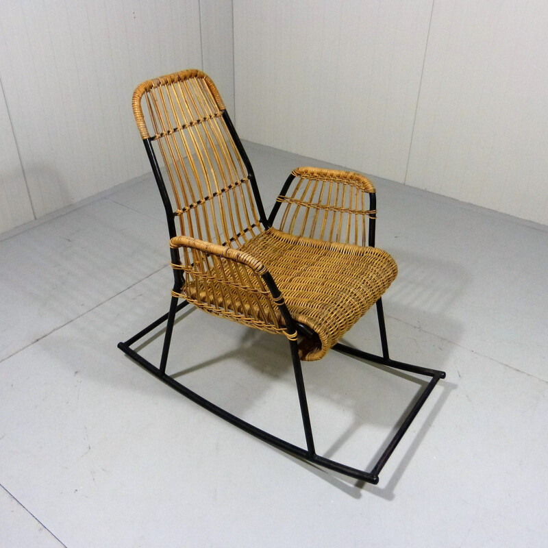 Rocking chair in rattan and black lacquered steel - 1950s