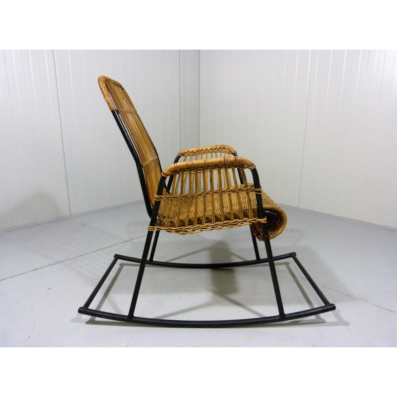 Rocking chair in rattan and black lacquered steel - 1950s