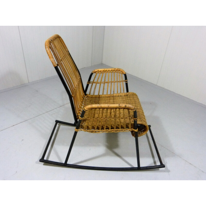 Rocking chair in rattan and black lacquered steel - 1950s