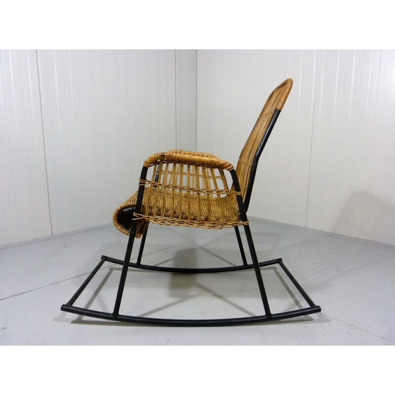 Rocking chair in rattan and black lacquered steel - 1950s