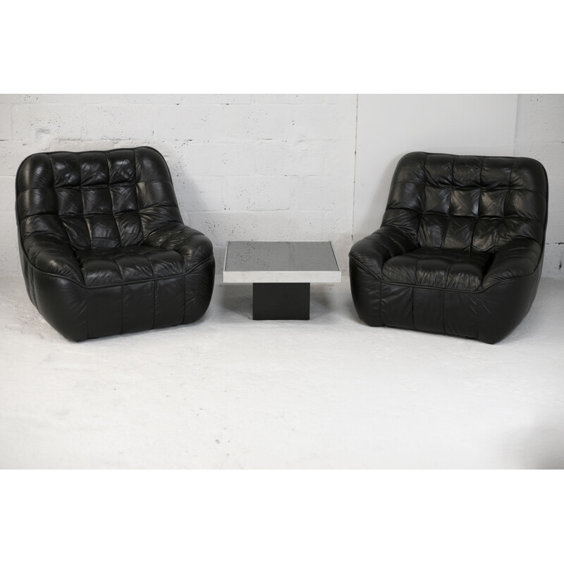 Pair of vintage black leather armchairs, France circa 1970