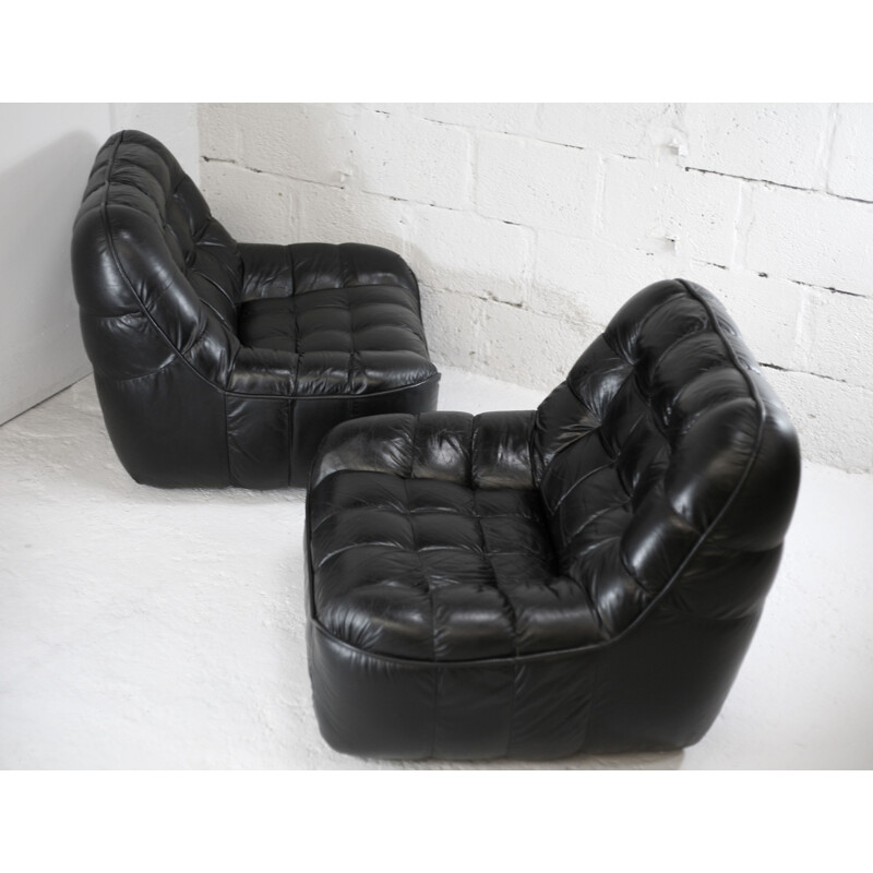 Pair of vintage black leather armchairs, France circa 1970