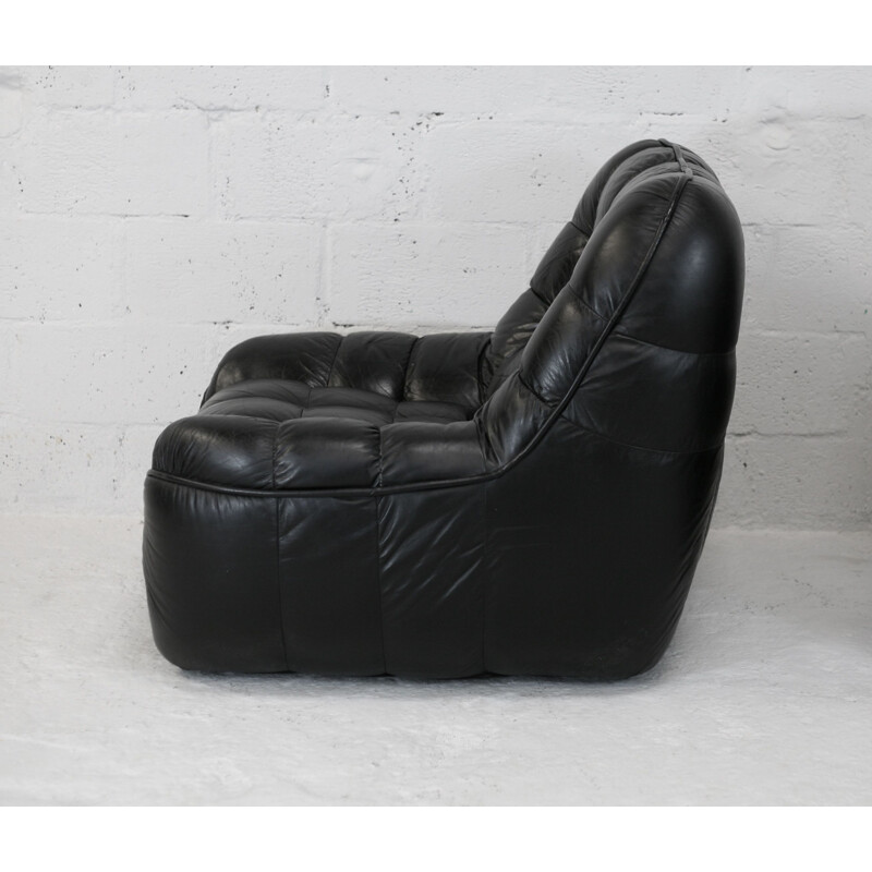 Pair of vintage black leather armchairs, France circa 1970