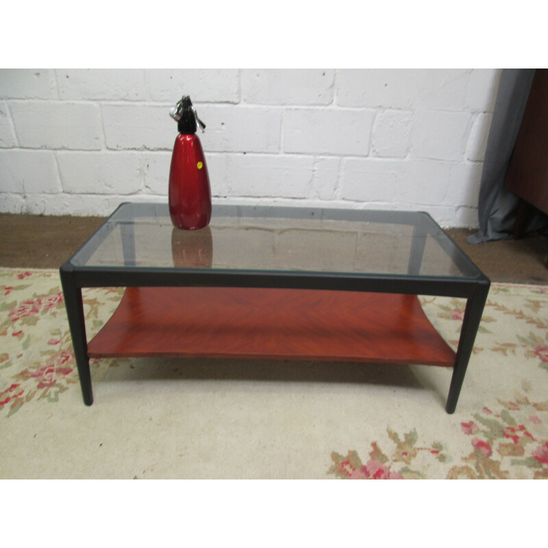 Table basse vintage en teck noir et verre