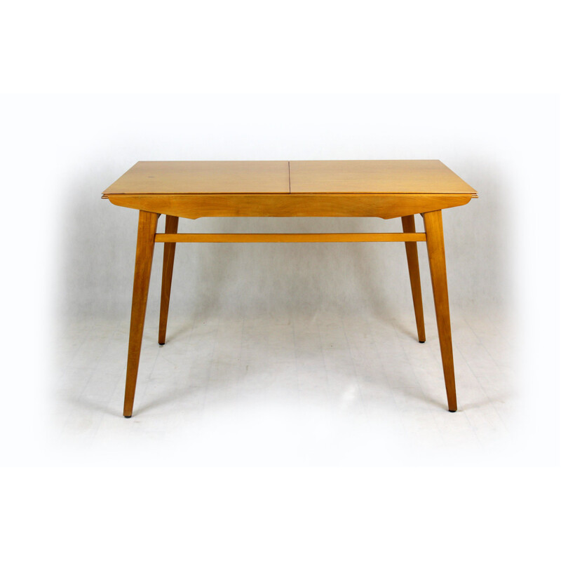 Extendable oakwood dining table from Tatra, 1960s