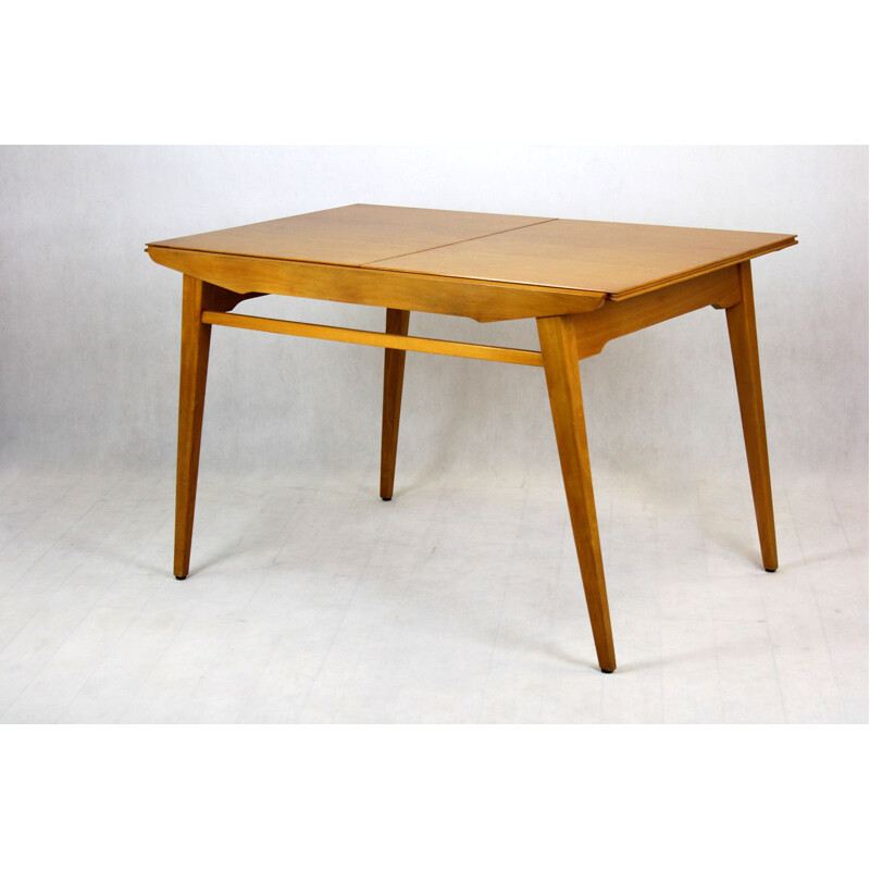 Extendable oakwood dining table from Tatra, 1960s
