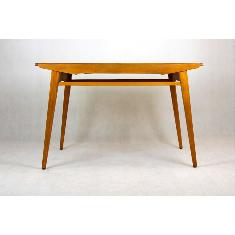 Extendable oakwood dining table from Tatra, 1960s