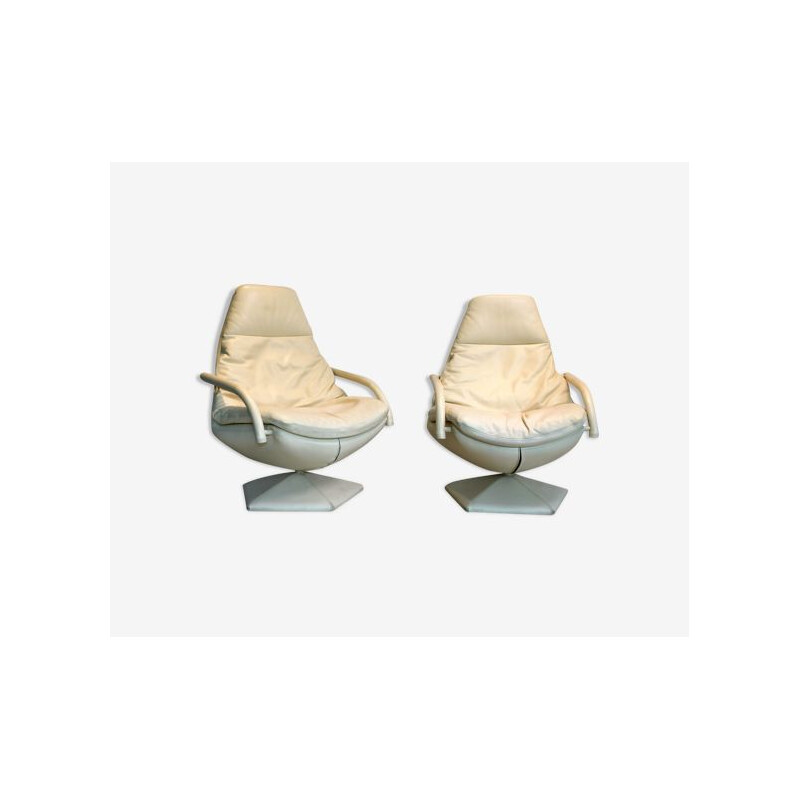 Paire de fauteuils pivotants vintage en cuir sur pied pentagonal