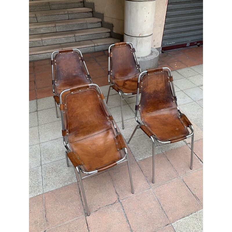 Set of 4 vintage Les Arcs chairs in cowhide and steel selected by Charlotte PERRIAND, 1960s
