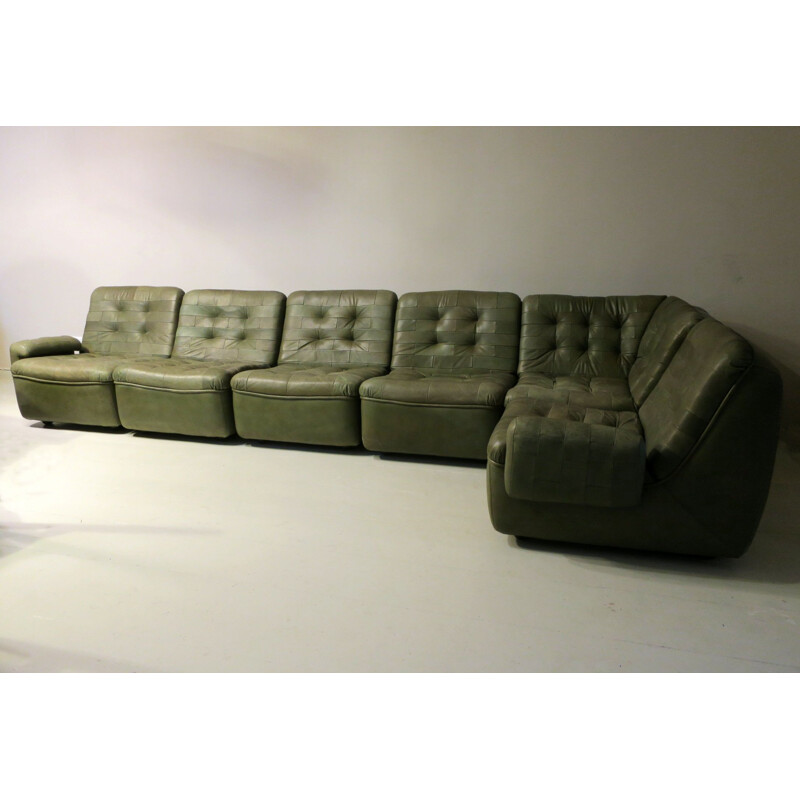 Mid century modular patchwork patinated leather sofa, 1970s