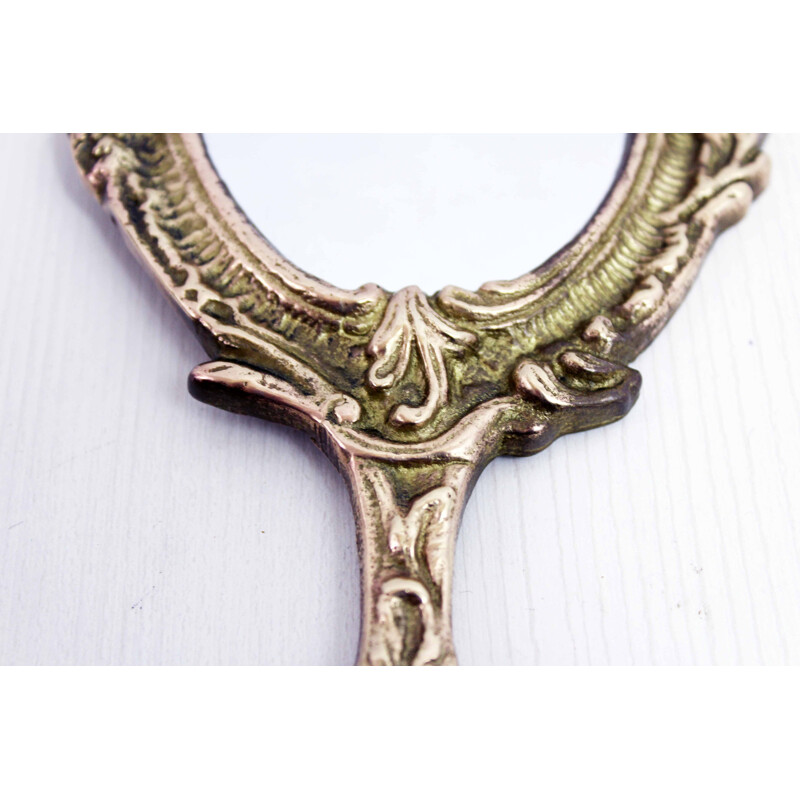 Vintage Art Nouveau hand mirror in bronze