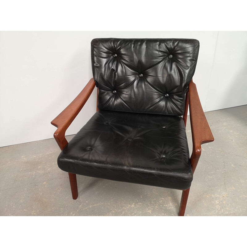 Scandinavian vintage teak and black leather armchair, 1970