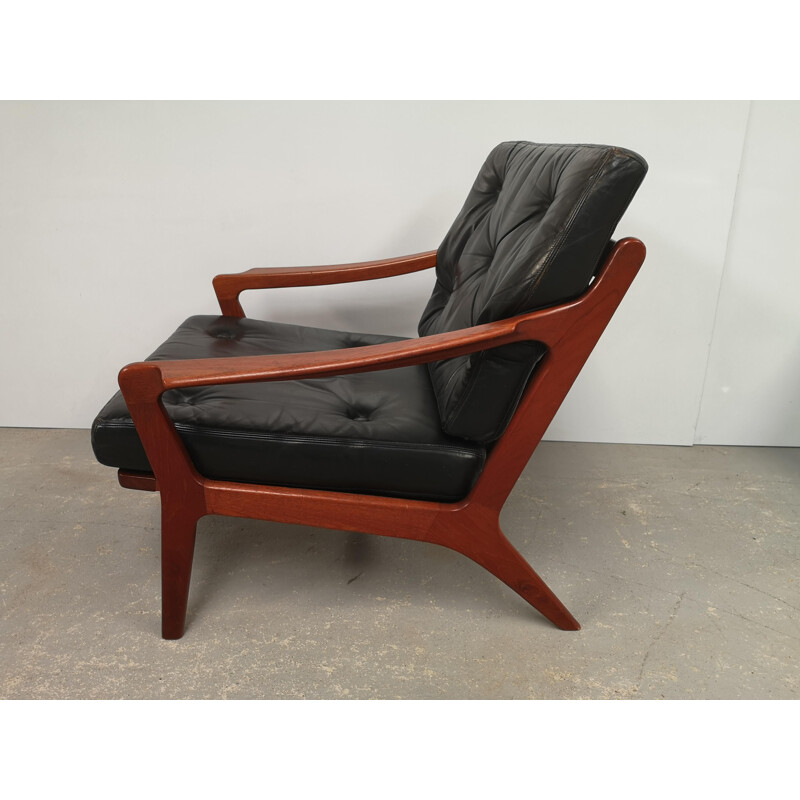 Scandinavian vintage teak and black leather armchair, 1970