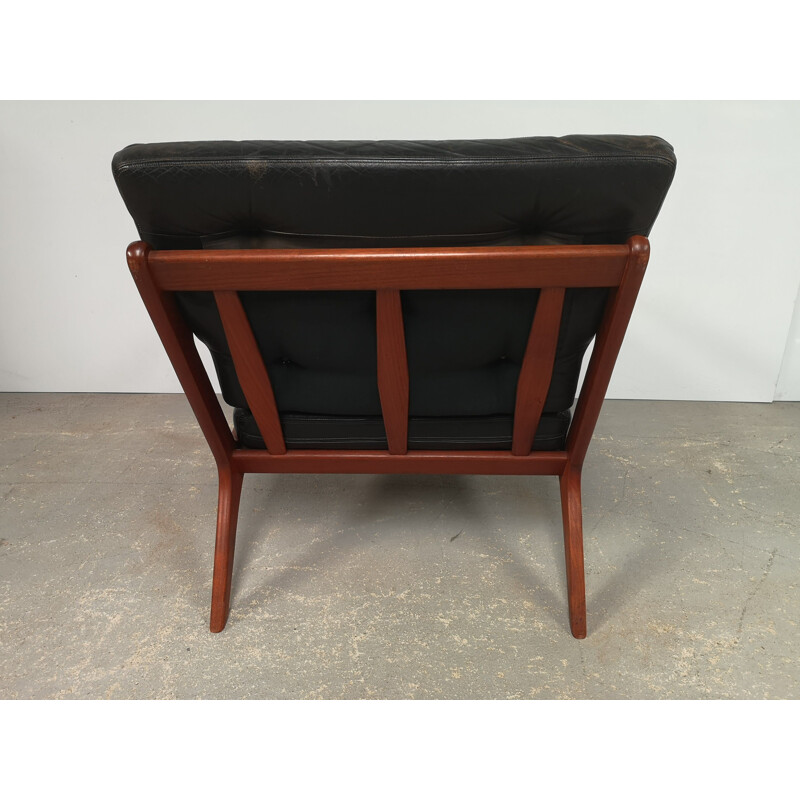 Scandinavian vintage teak and black leather armchair, 1970