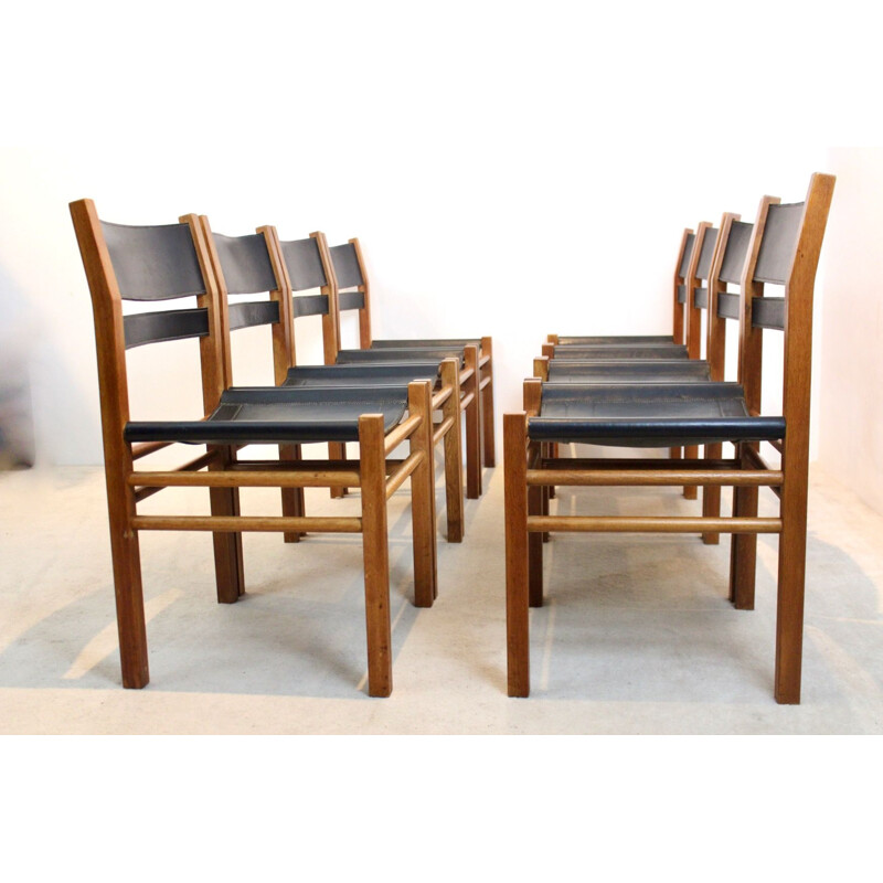 Ensemble de 8 chaises vintage en chêne et cuir de selle