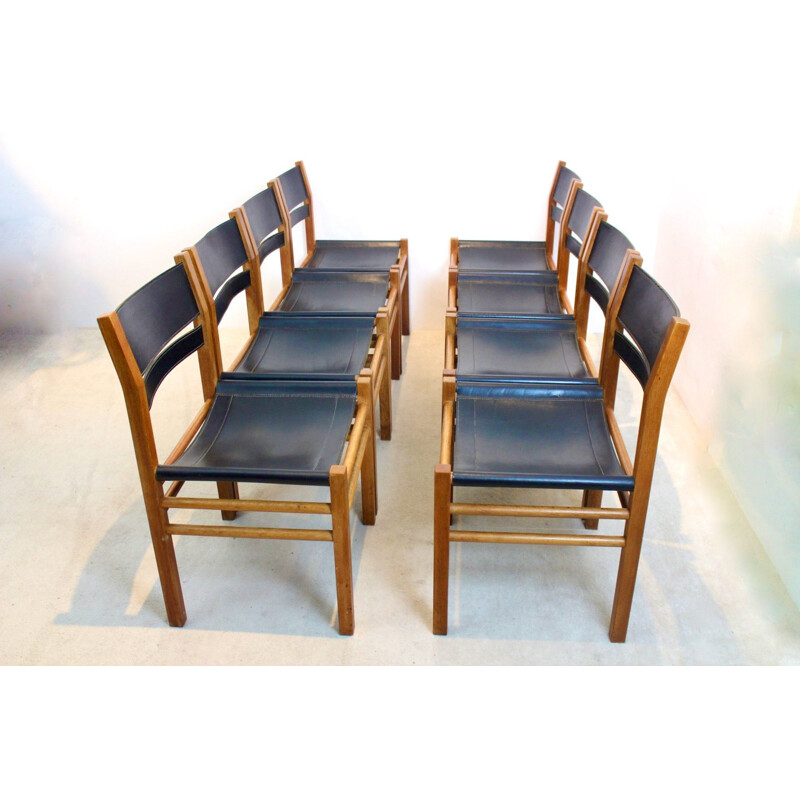 Ensemble de 8 chaises vintage en chêne et cuir de selle