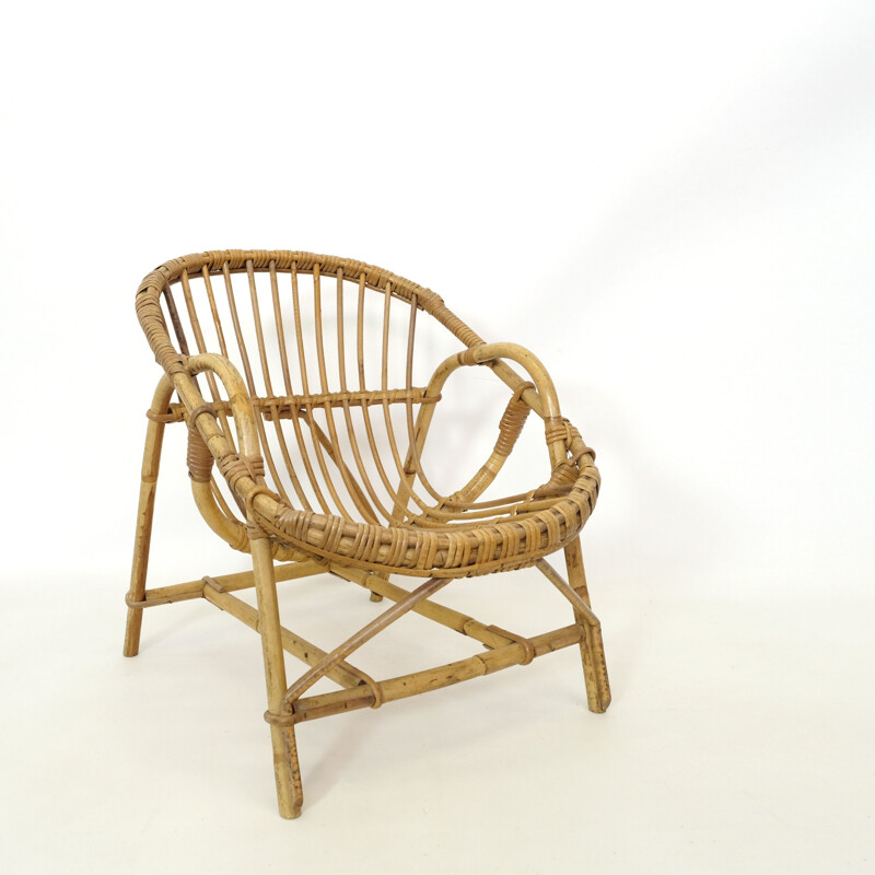 Vintage children's chair in rattan, 1960-1970