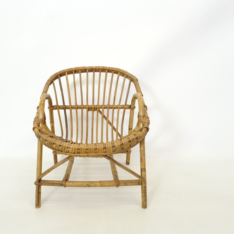 Vintage children's chair in rattan, 1960-1970