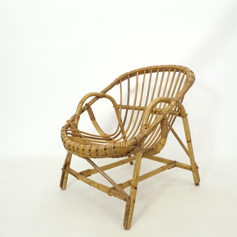 Vintage children's chair in rattan, 1960-1970