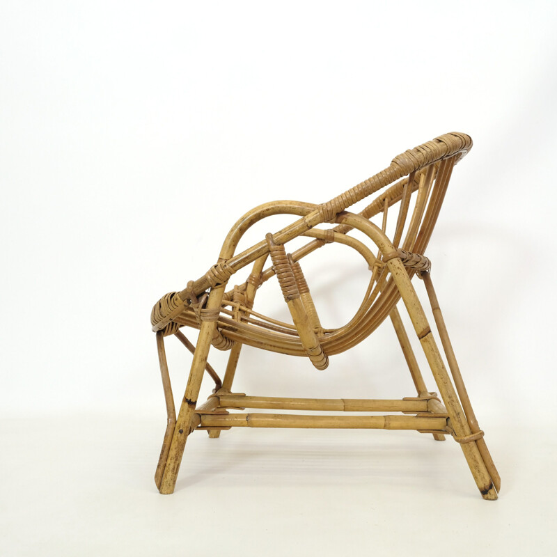 Vintage children's chair in rattan, 1960-1970