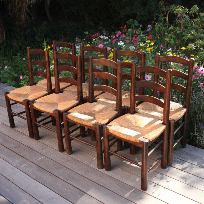 Set of 8 vintage wood and straw chairs by Georges Robert, 1950
