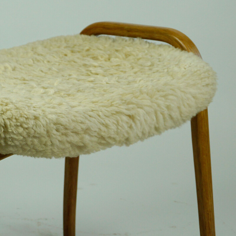 Vintage oakwood and white sheepskin lamino footrest by Yngve Ekstrom for Swedese, Sweden 1950s