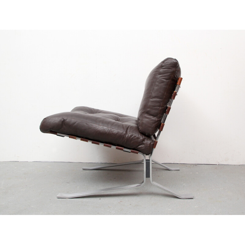 Lounge chair in leather and chromed steel - 1970s