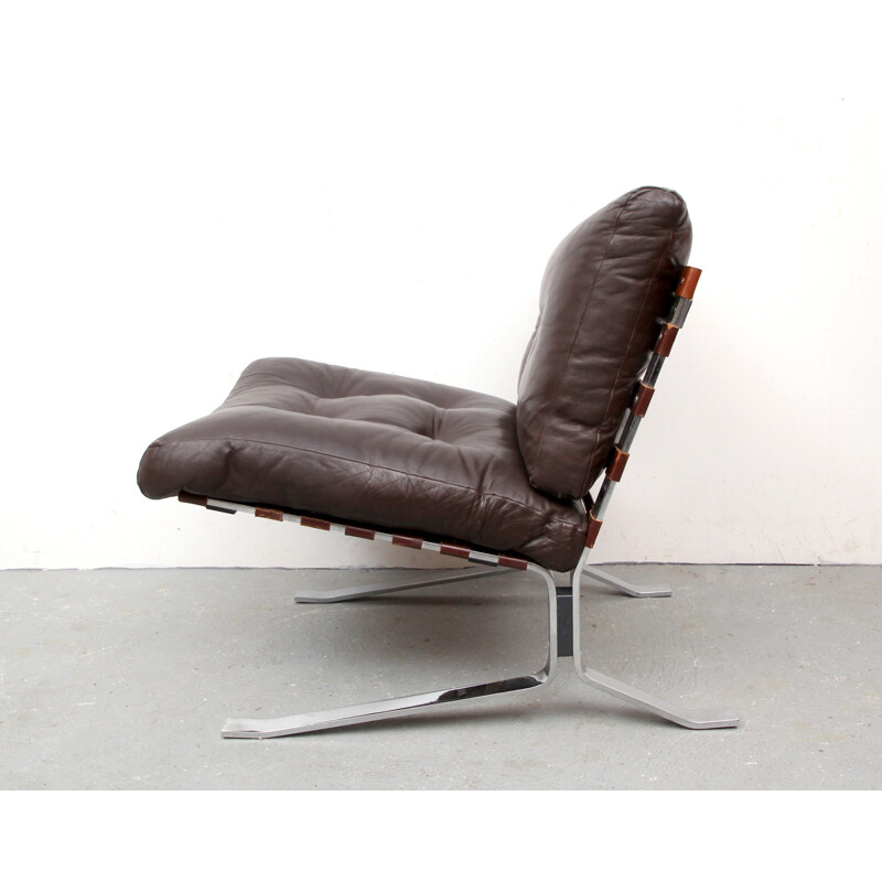 Lounge chair in leather and chromed steel - 1970s