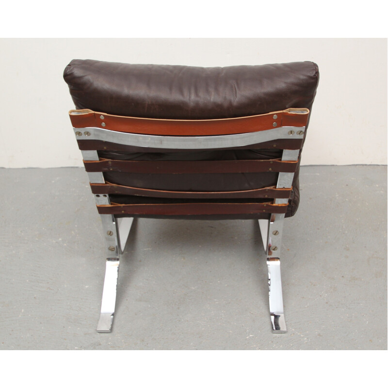 Lounge chair in leather and chromed steel - 1970s