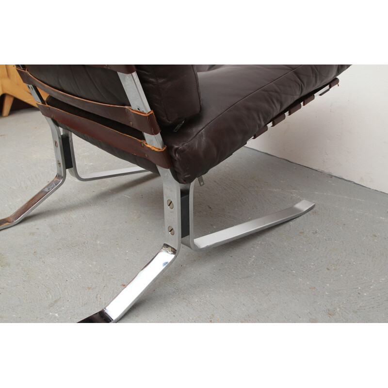 Lounge chair in leather and chromed steel - 1970s
