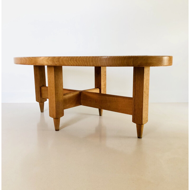 Vintage oval coffee table in solid light oak by Guillerme and Chambron, France 1960